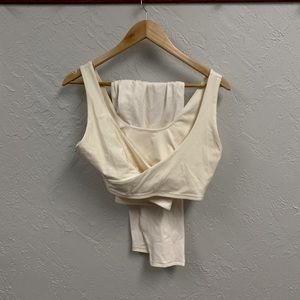 Fabletics Oasis PureLuxe Crossover Leggings. Size M in colour “egret” cream.